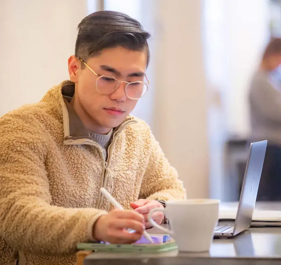 Student working at laptop