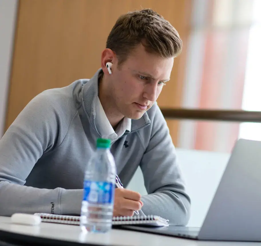 Student studying at table