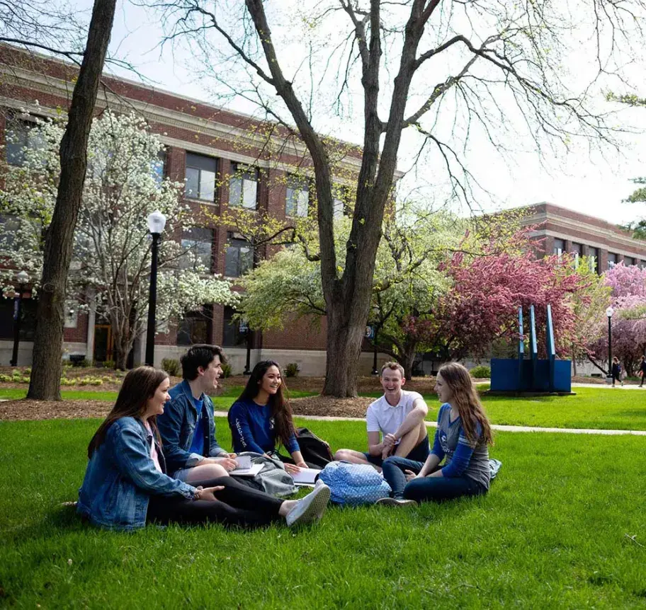 Students gathering outdoors on Creighton campus