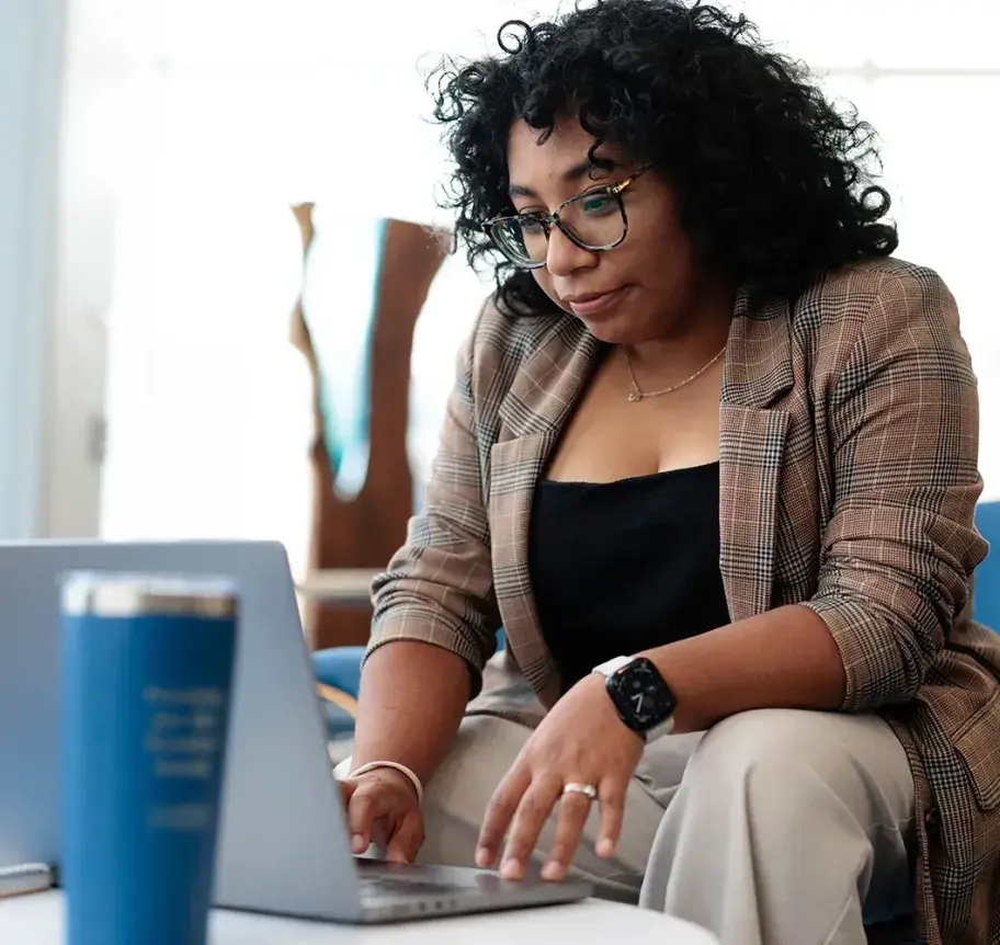 Professional studying on laptop