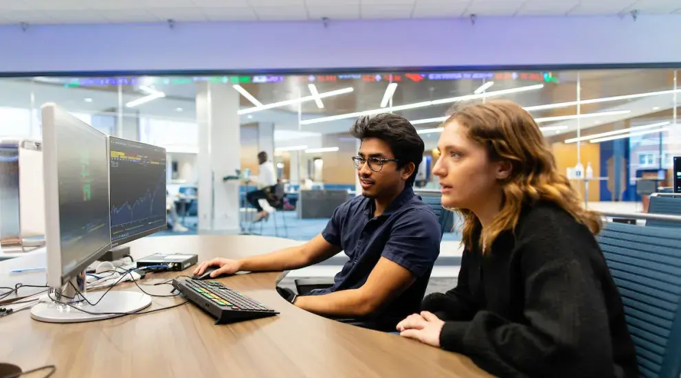 Students working together at computer