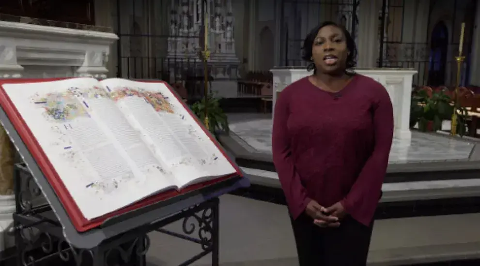 Video thumbnail featuring Vivian Amu next to the St. John's Bible