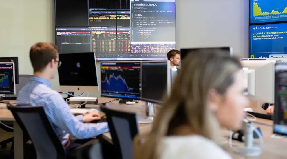 Business students studying data