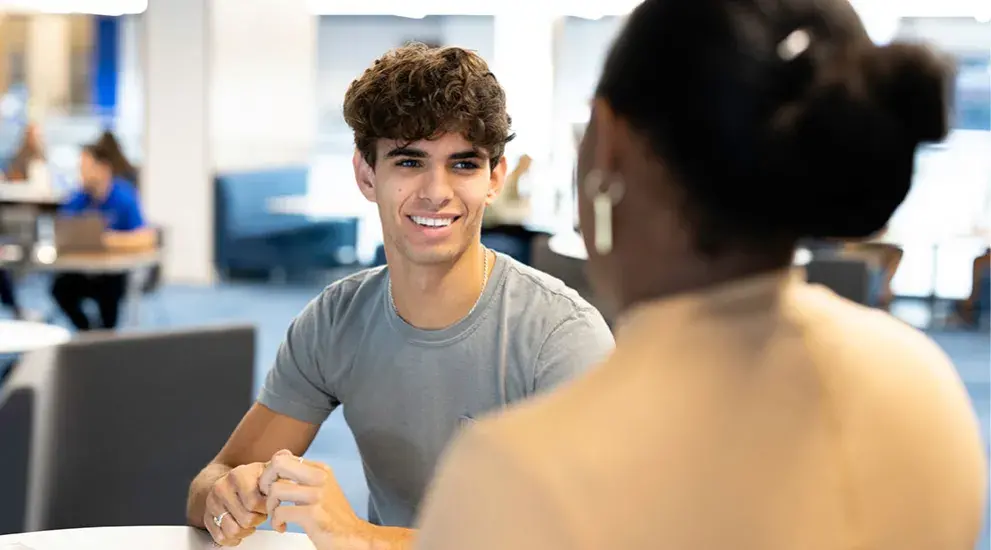 Student and Counselor chatting