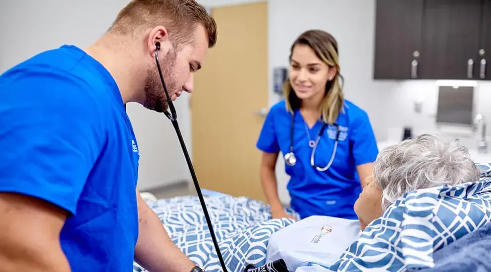 Nurse taking blood pressure