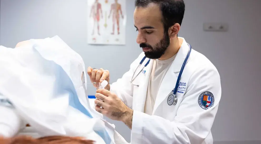 male medical student doing a lumbar punch