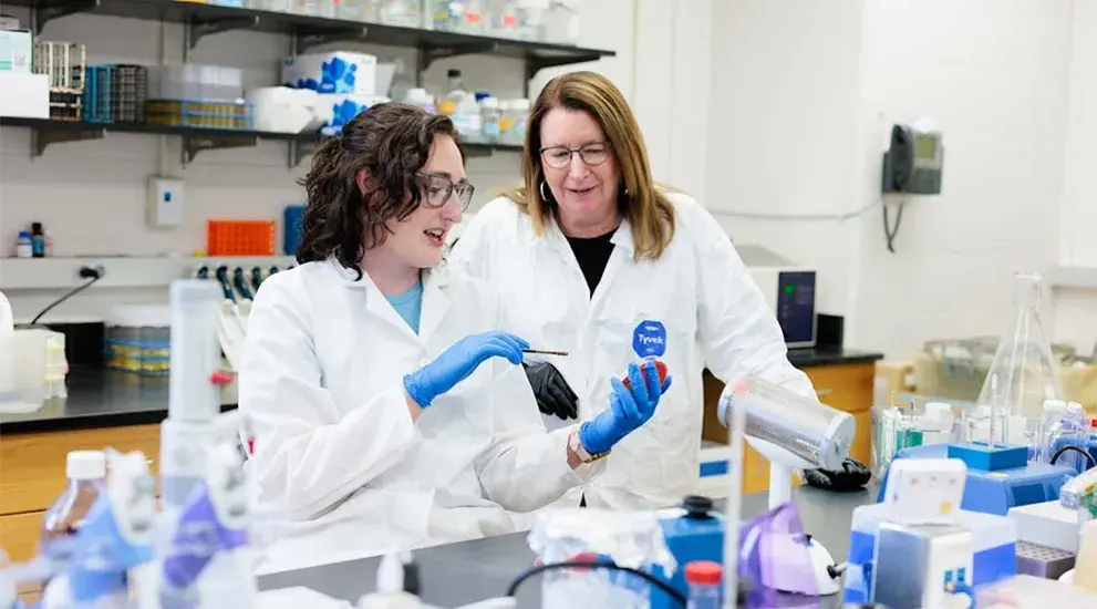 Student and faculty engaged in medicine research