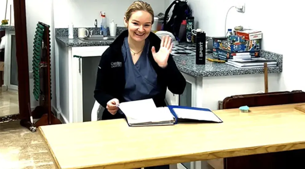 Olivia Brem in office area.