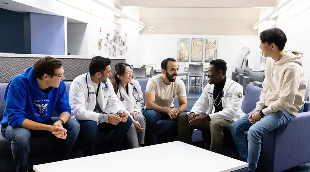 SOM students meeting together