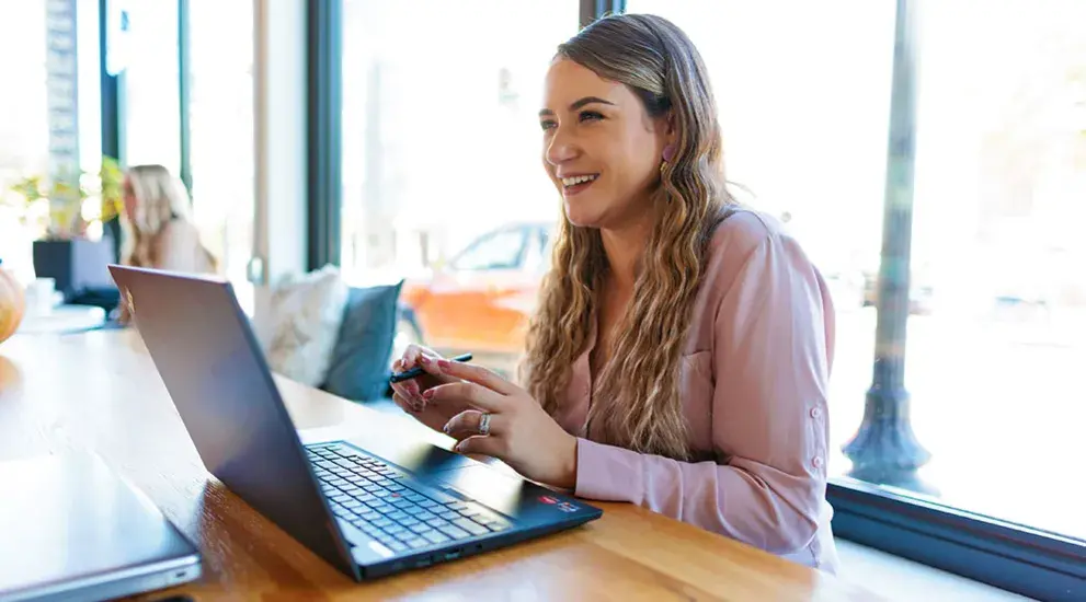 Dental student on laptop