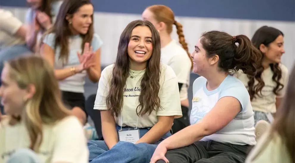 Sorority sisters having fun during group activity.