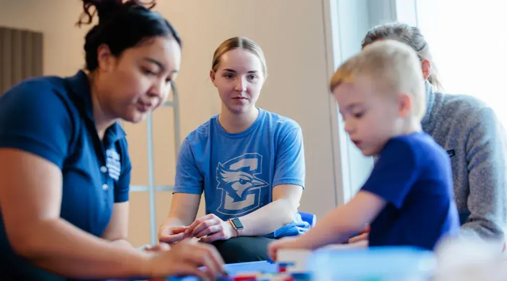 PT residents working with pediatric patient