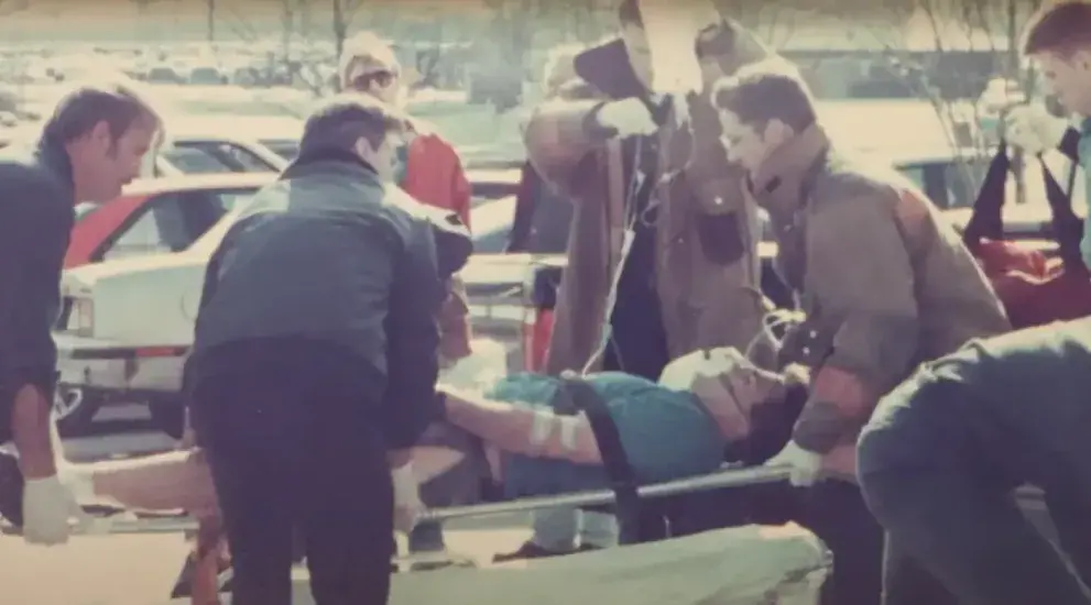 Archival image of Creighton paramedicine students practicing care.