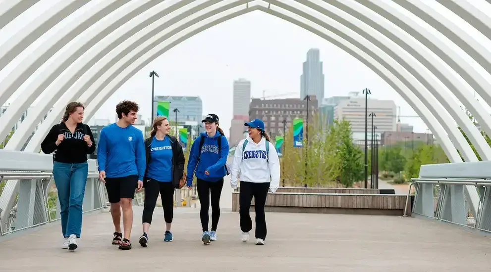 Creighton students walking in downtown Omaha.