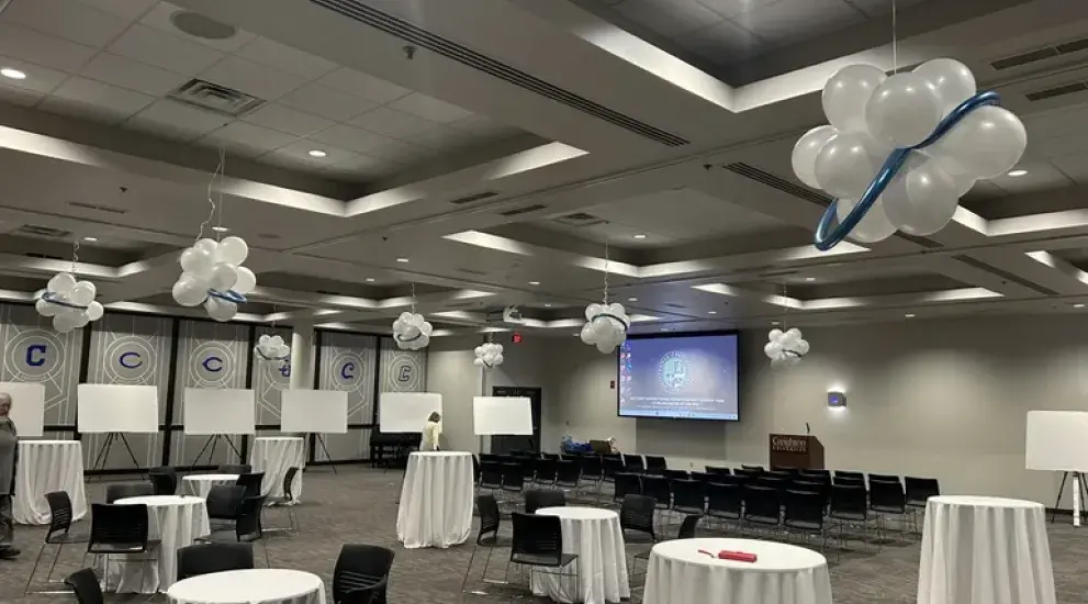 Small tables in ballroom.