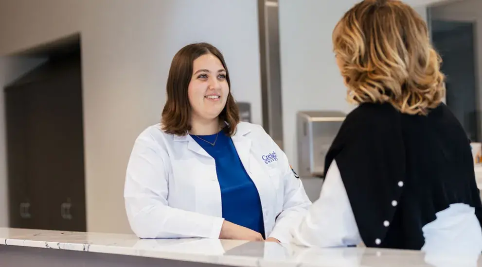 Nurses talking in conference room