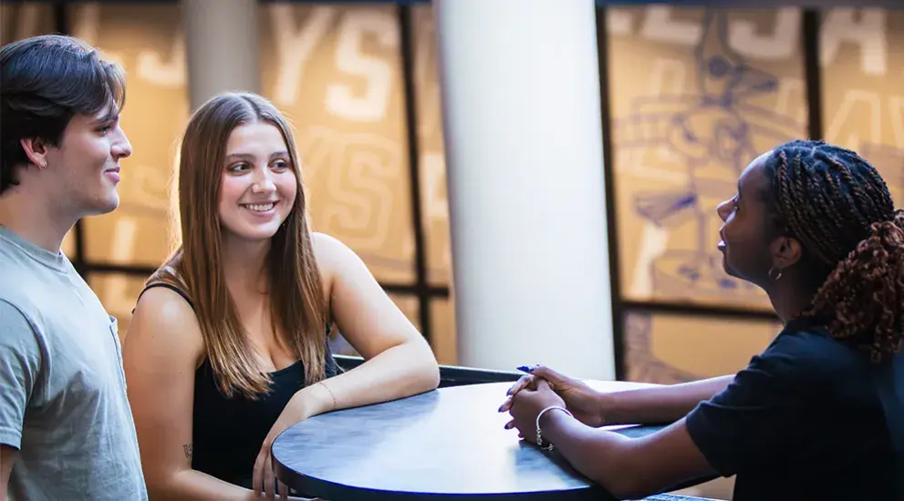 Students talking with an advisor
