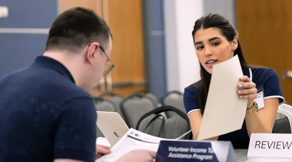 Students collaborating in a conference room