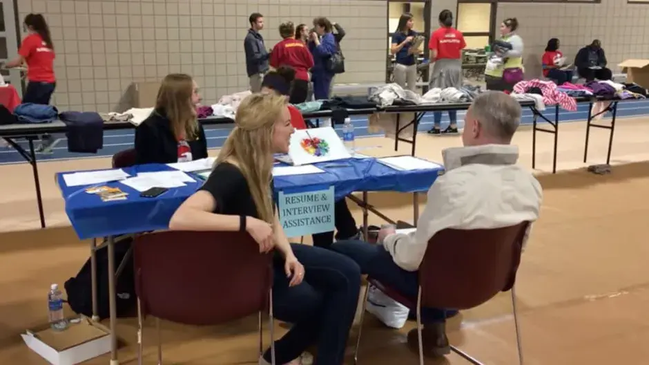 Video thumbnail featuring communication studies students participating in Project Homeless Connect Omaha